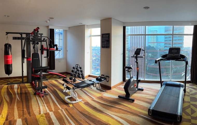 Fitness Center - Stay fit during your stay with our modern gym equipped with cardio machines, weights, and training e...